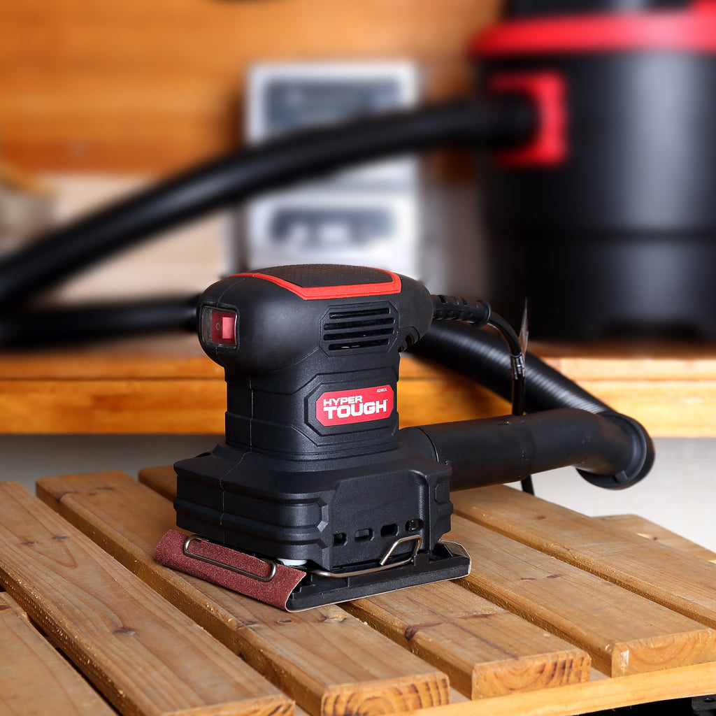 2 Amp Corded 1/4 Sheet Palm Sander with Dust Bag, Vacuum Hose Adapter, Punch Plate & 3 Sanding Sheets, New Condition